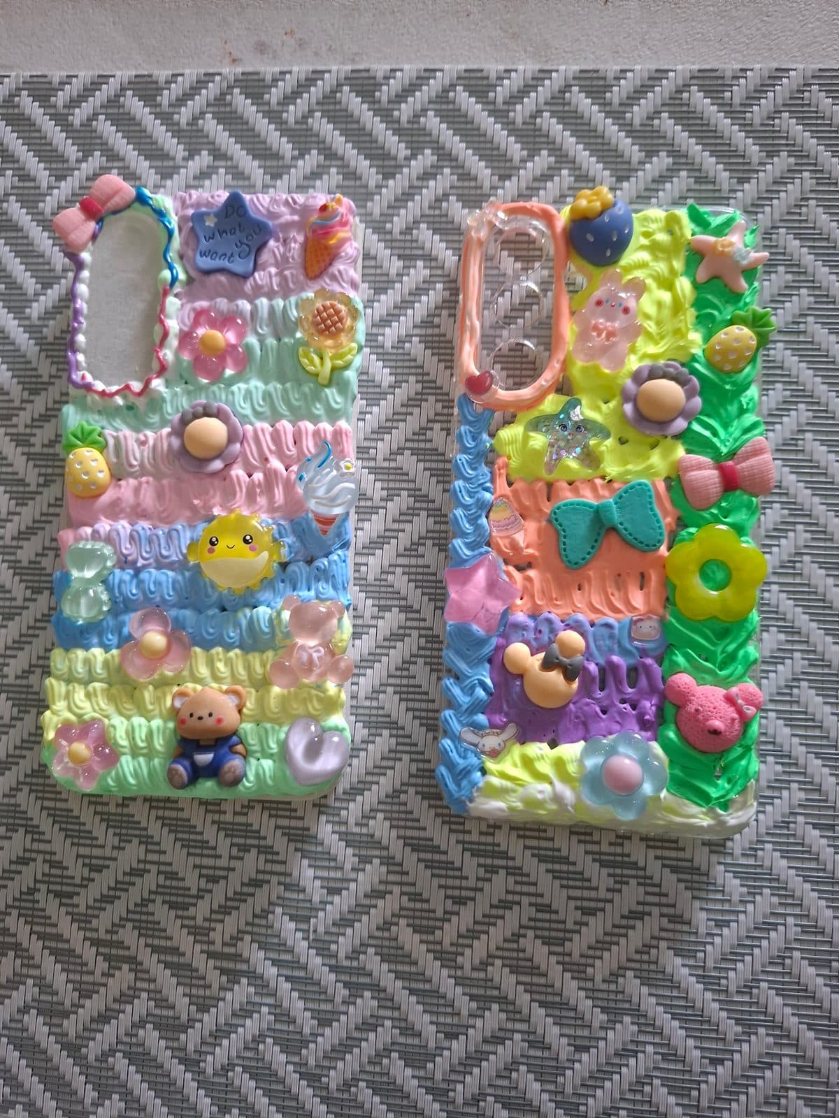 A pair of pastel decoden phone cases side by side